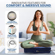 Person experiencing deep relaxation using the vibroacoustic therapy meditation cushion for stress relief and mindfulness.
