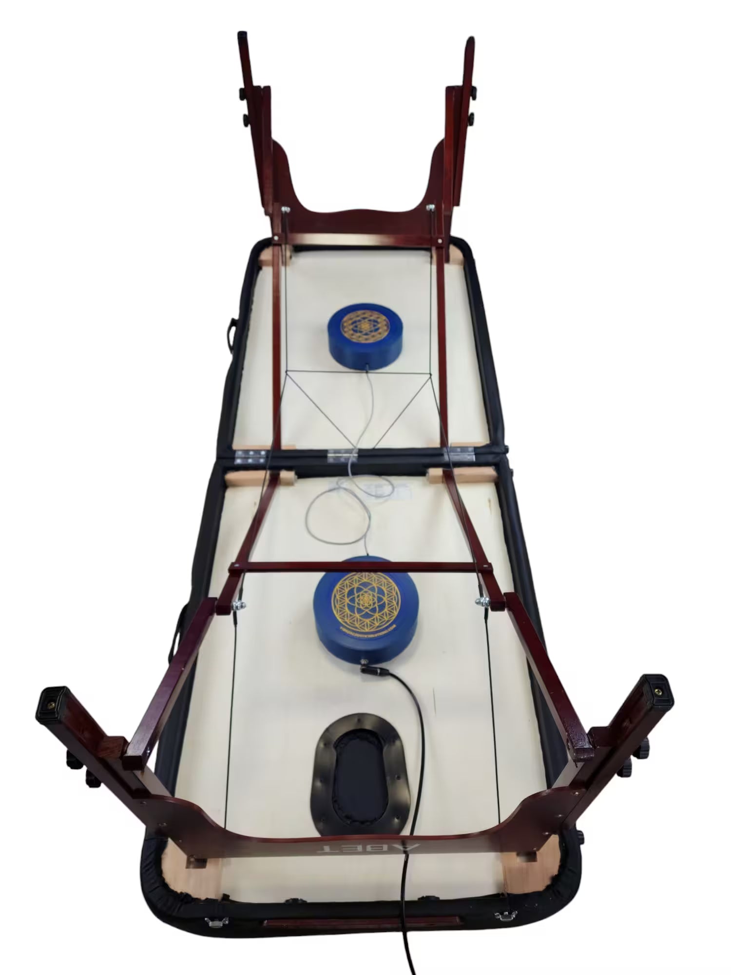 Vibroacoustic therapy massage table attachments showcasing  placement of attachments for stationary massage table, designed to enhance vibrations during massage practices.