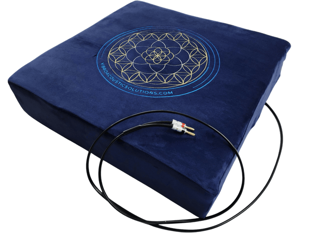 Navy blue vibroacoustic meditation cushion kit with quad transducers, for stress relief.